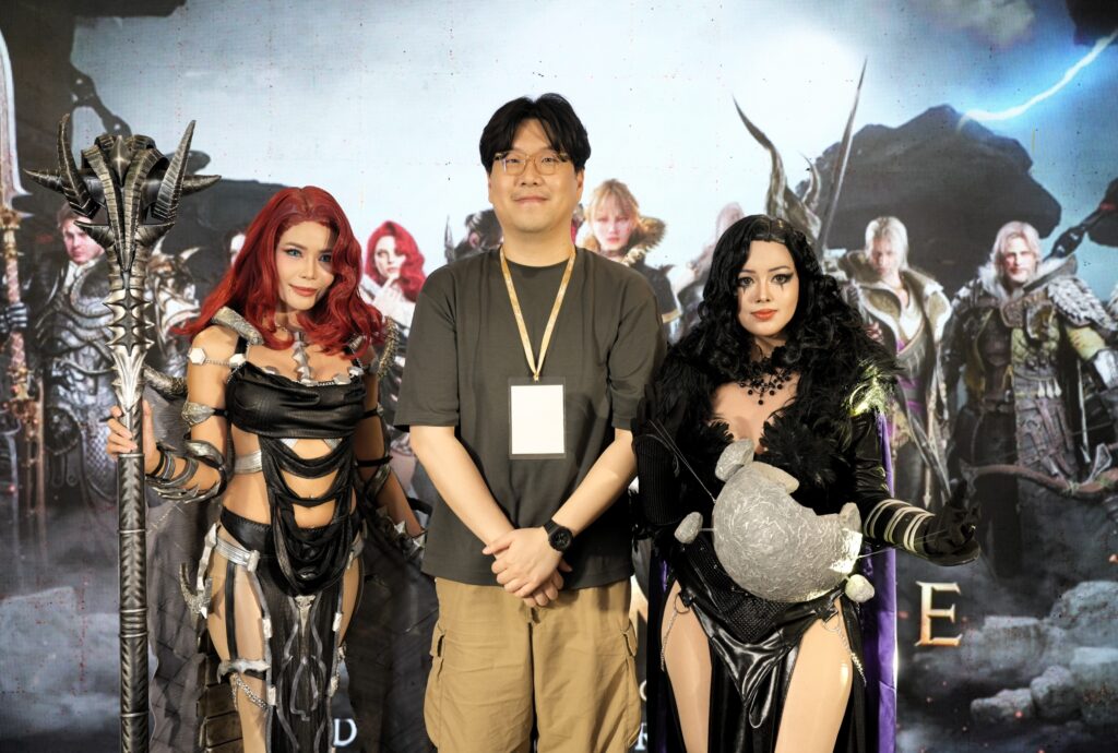 Joong Hyuk Park Global Business Team Manager with Cosplayers Myrtle Sarrosa and Diane Sabandeja